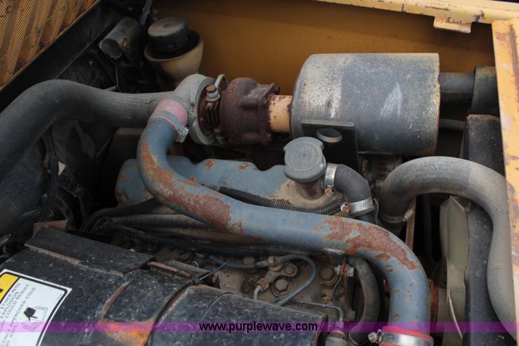 image for item J2042 1995 New Holland LX885 skid steer