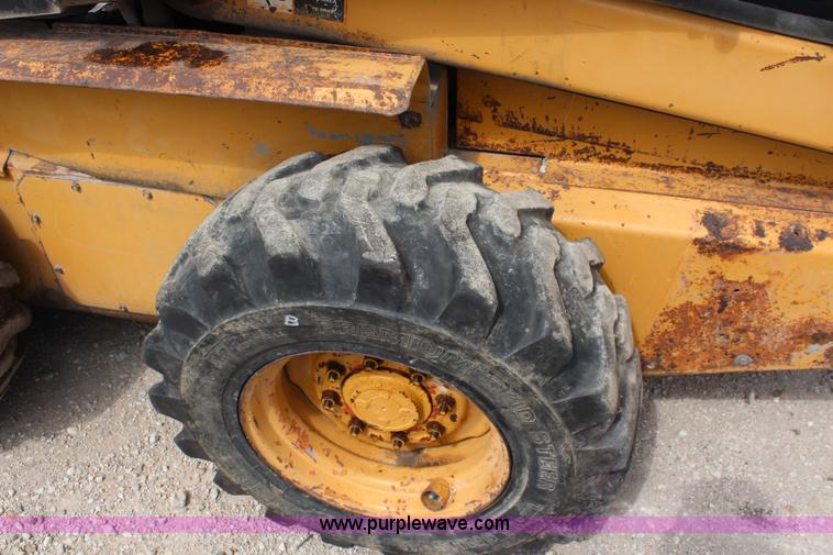 image for item J2042 1995 New Holland LX885 skid steer