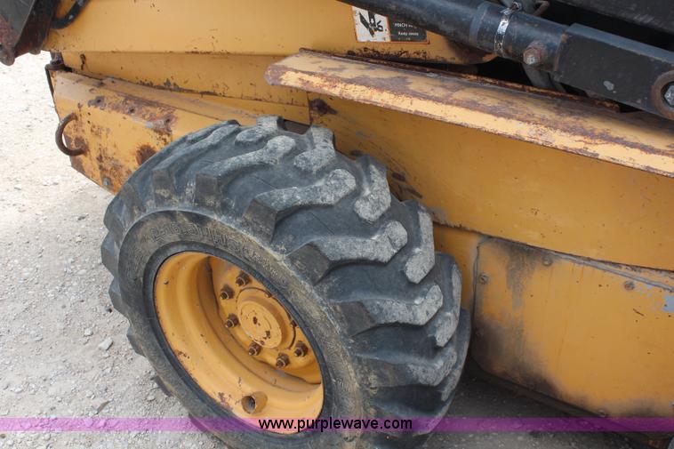 image for item J2042 1995 New Holland LX885 skid steer