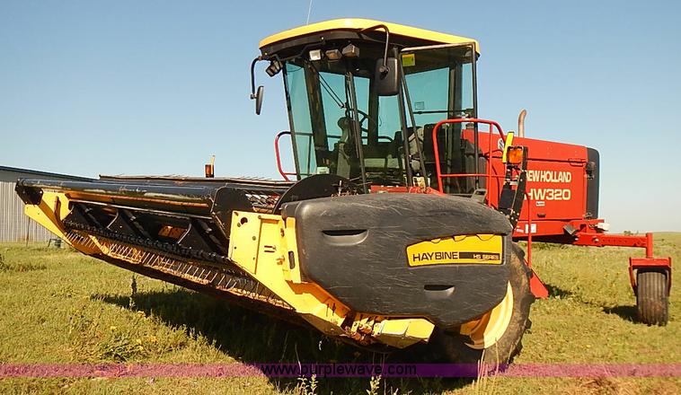 image for item J2239 2003 New Holland HW320 self-propelled swather