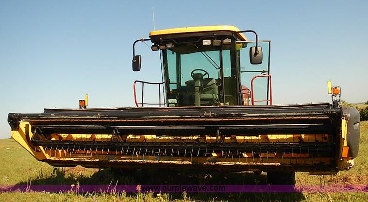 image for item J2239 2003 New Holland HW320 self-propelled swather