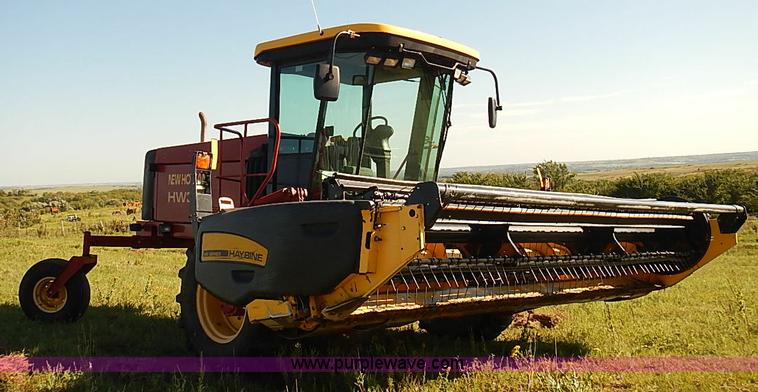 image for item J2239 2003 New Holland HW320 self-propelled swather