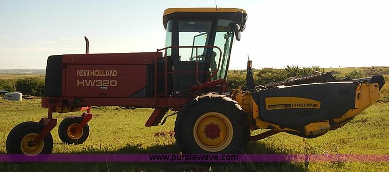 image for item J2239 2003 New Holland HW320 self-propelled swather