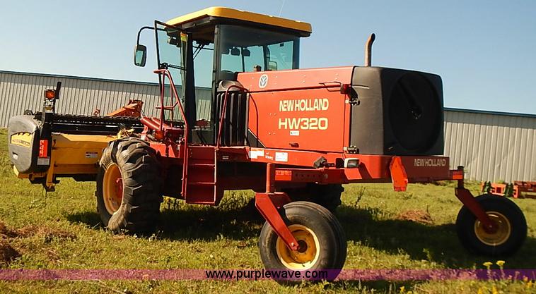 image for item J2239 2003 New Holland HW320 self-propelled swather