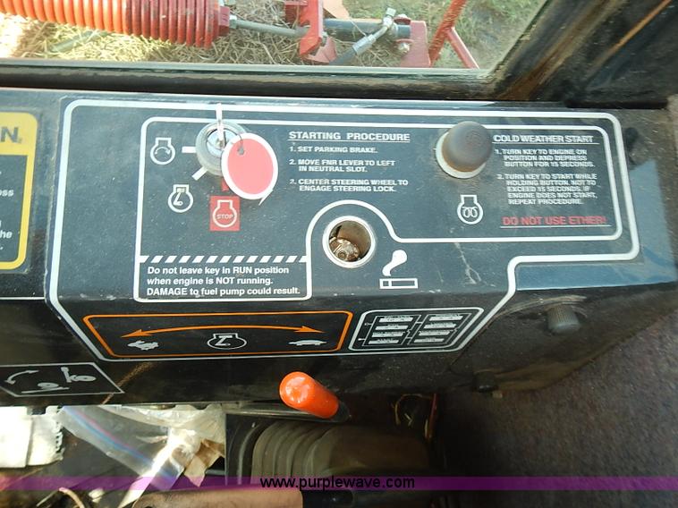 image for item J2239 2003 New Holland HW320 self-propelled swather