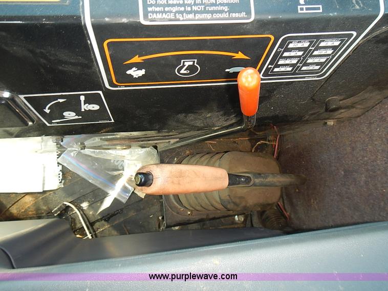 image for item J2239 2003 New Holland HW320 self-propelled swather