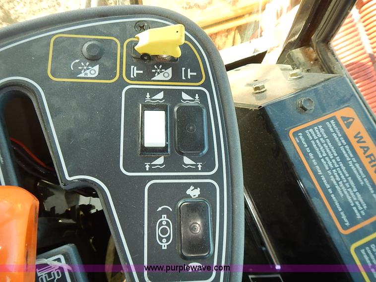 image for item J2239 2003 New Holland HW320 self-propelled swather