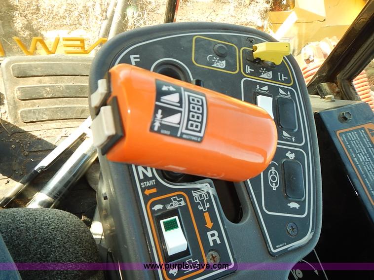 image for item J2239 2003 New Holland HW320 self-propelled swather