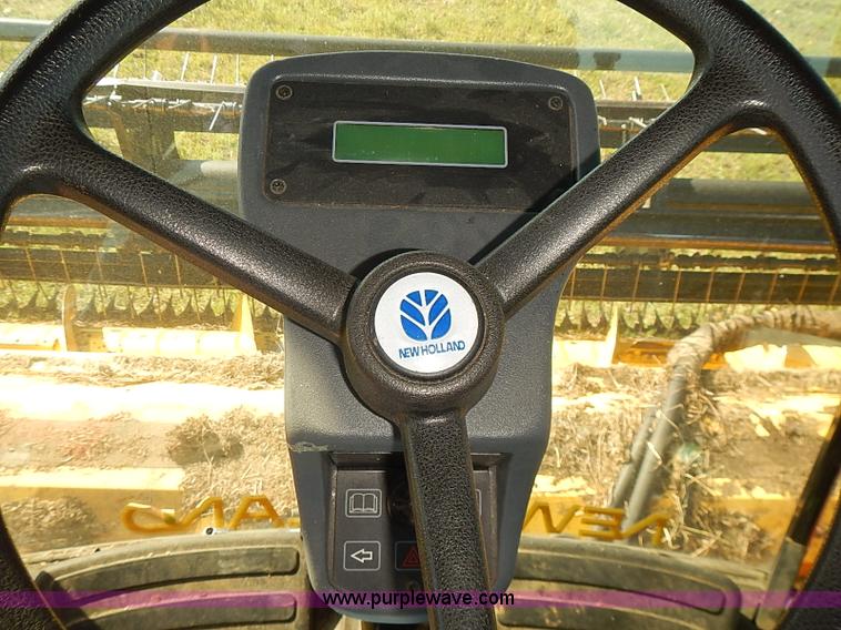 image for item J2239 2003 New Holland HW320 self-propelled swather