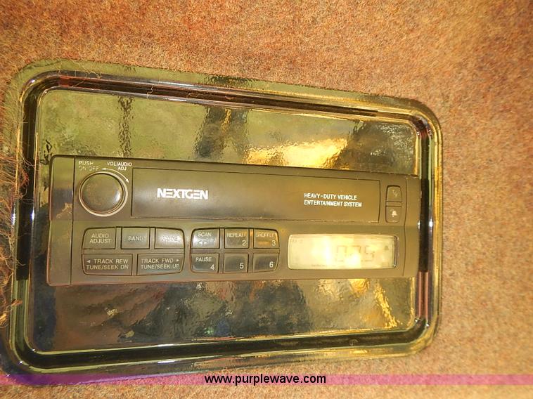 image for item J2239 2003 New Holland HW320 self-propelled swather