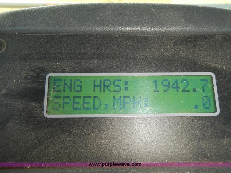 image for item J2239 2003 New Holland HW320 self-propelled swather