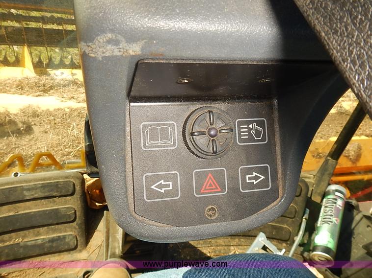 image for item J2239 2003 New Holland HW320 self-propelled swather