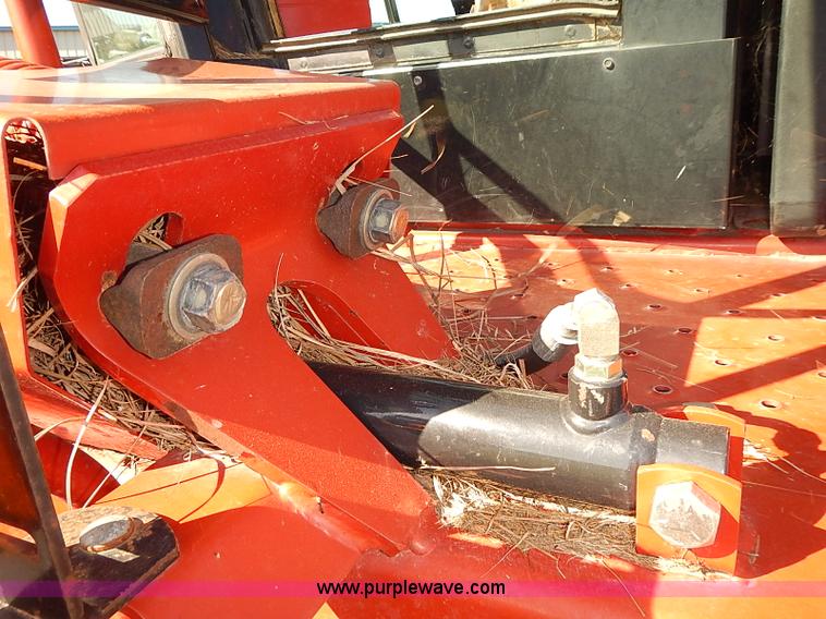 image for item J2239 2003 New Holland HW320 self-propelled swather