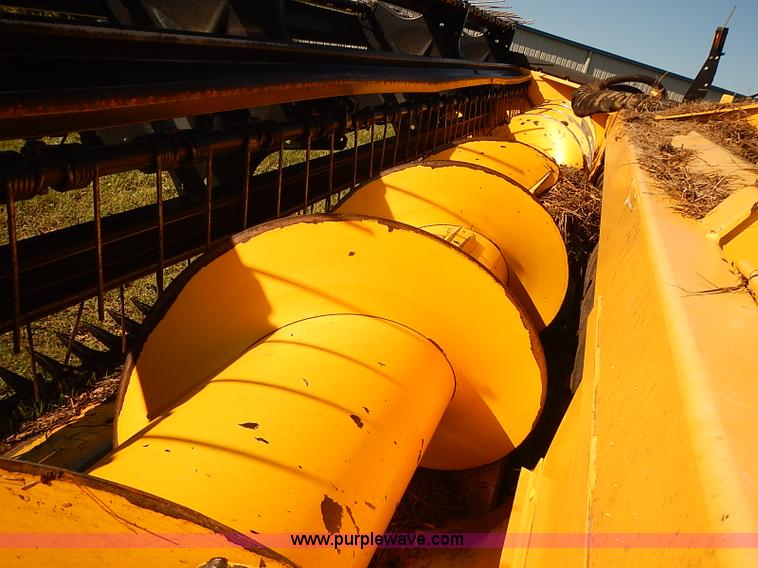 image for item J2239 2003 New Holland HW320 self-propelled swather