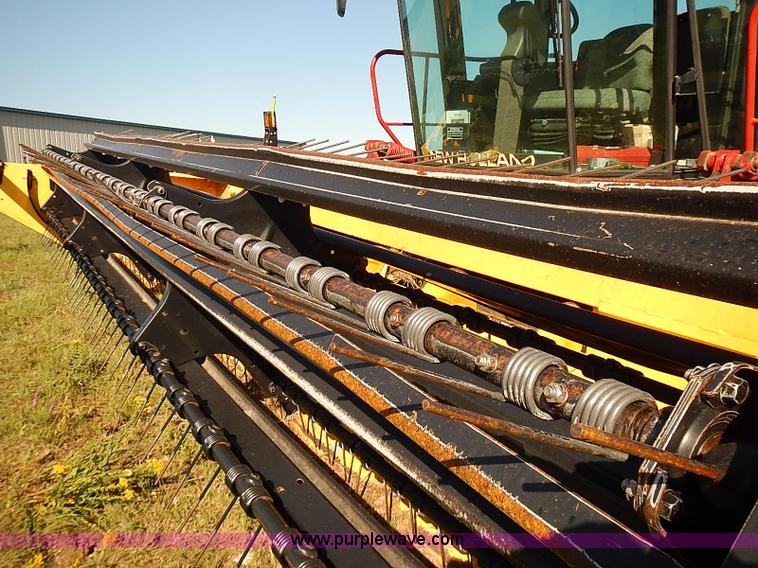 image for item J2239 2003 New Holland HW320 self-propelled swather