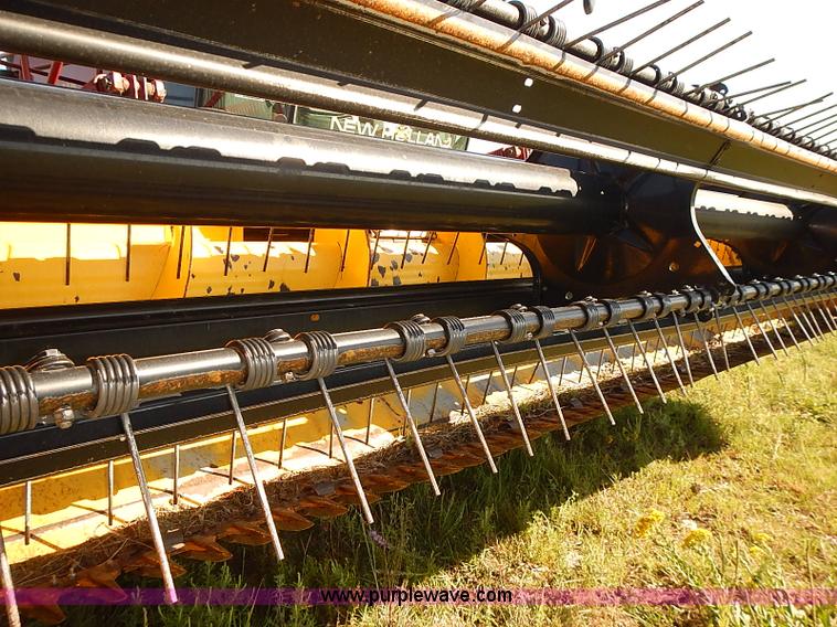 image for item J2239 2003 New Holland HW320 self-propelled swather