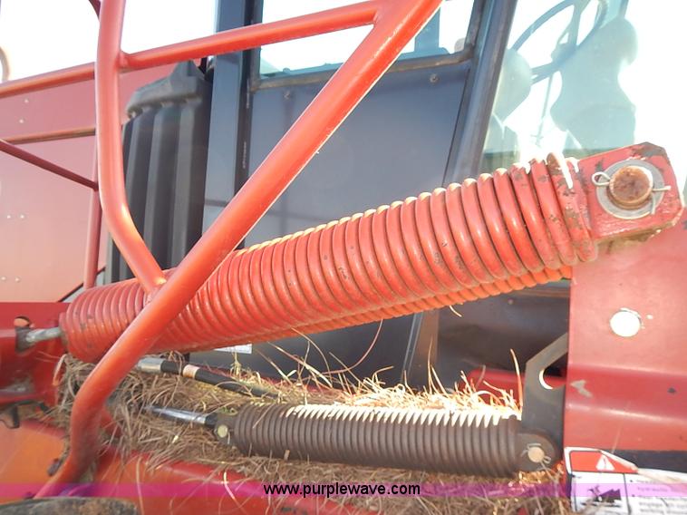 image for item J2239 2003 New Holland HW320 self-propelled swather