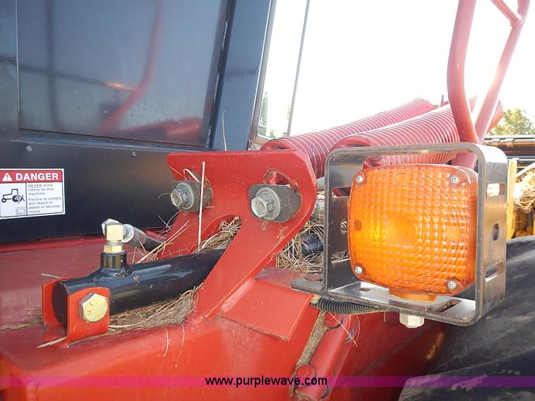 image for item J2239 2003 New Holland HW320 self-propelled swather