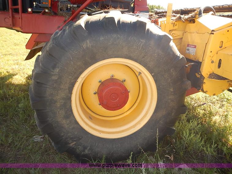 image for item J2239 2003 New Holland HW320 self-propelled swather