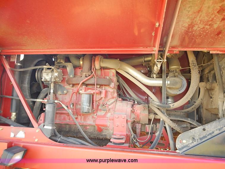 image for item J2239 2003 New Holland HW320 self-propelled swather