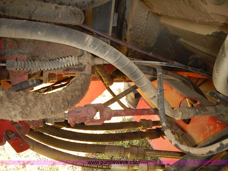 image for item J2239 2003 New Holland HW320 self-propelled swather