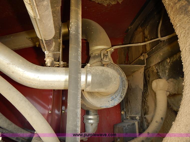 image for item J2239 2003 New Holland HW320 self-propelled swather