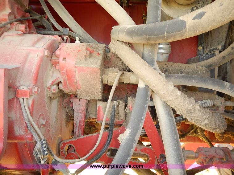 image for item J2239 2003 New Holland HW320 self-propelled swather