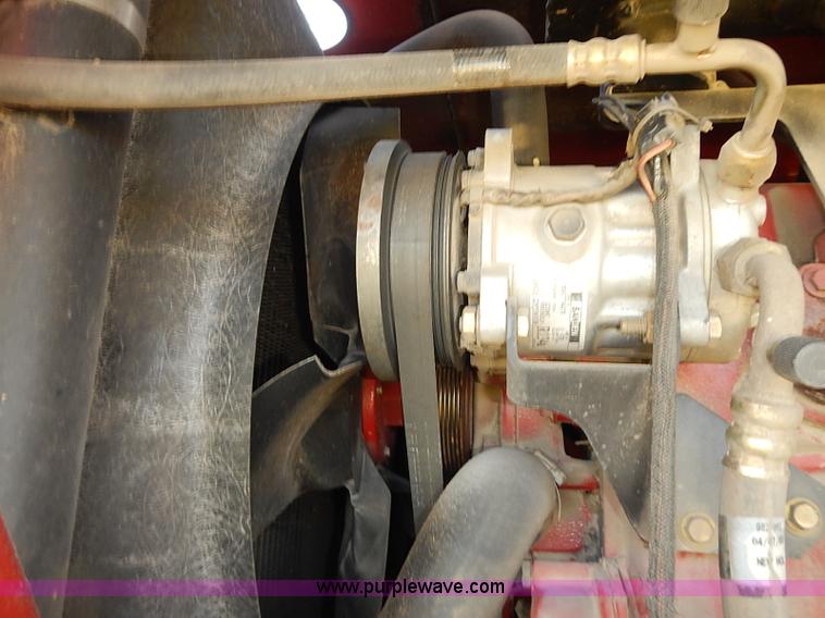 image for item J2239 2003 New Holland HW320 self-propelled swather