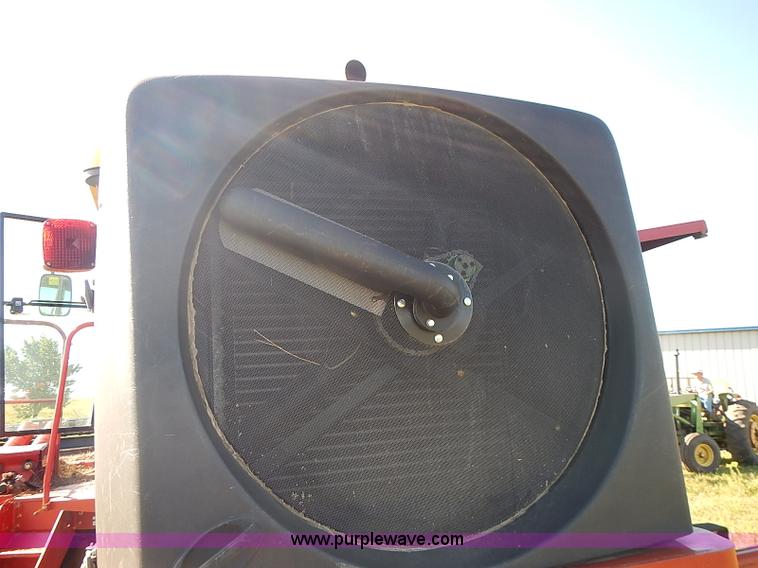 image for item J2239 2003 New Holland HW320 self-propelled swather