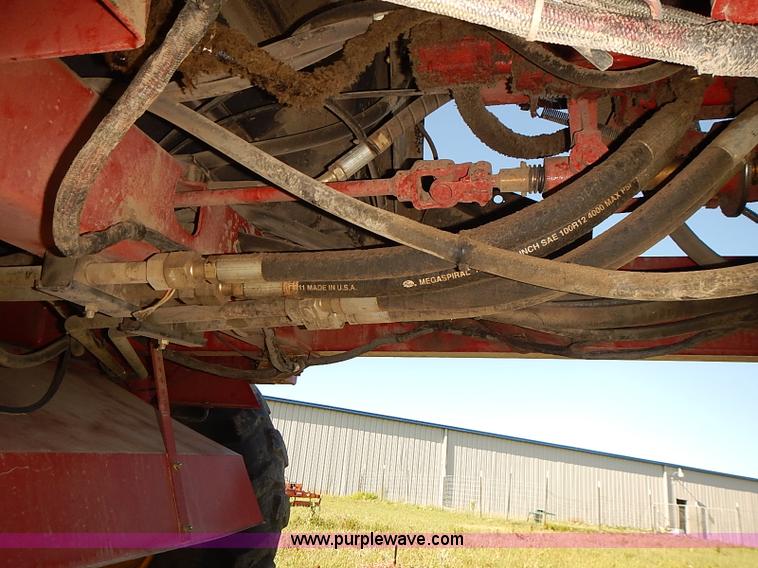 image for item J2239 2003 New Holland HW320 self-propelled swather