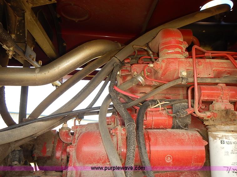 image for item J2239 2003 New Holland HW320 self-propelled swather