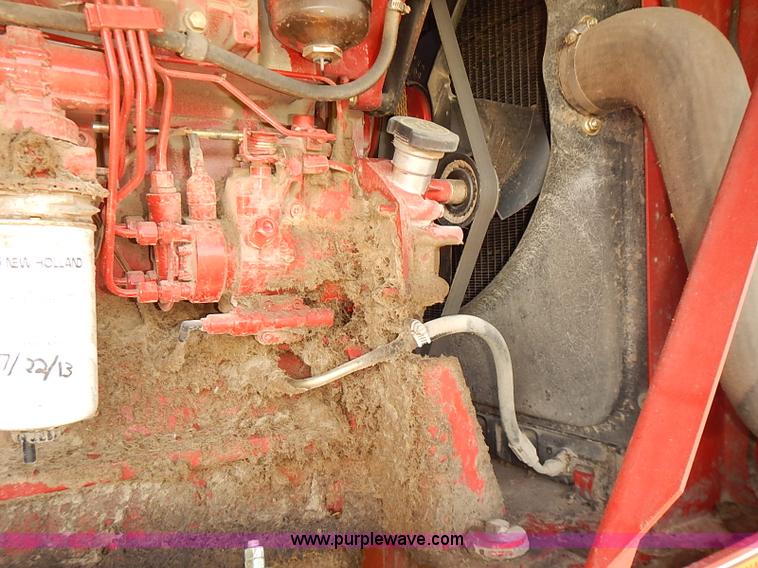 image for item J2239 2003 New Holland HW320 self-propelled swather