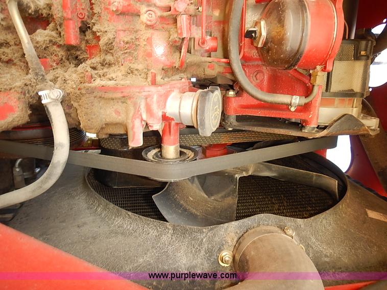 image for item J2239 2003 New Holland HW320 self-propelled swather