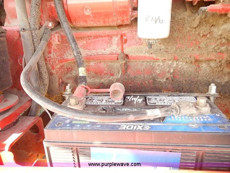 image for item J2239 2003 New Holland HW320 self-propelled swather