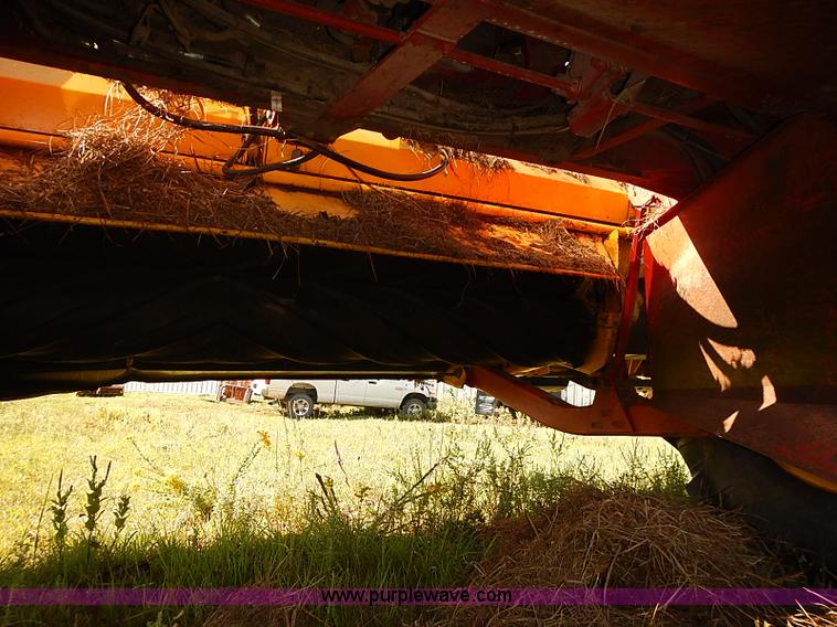 image for item J2239 2003 New Holland HW320 self-propelled swather