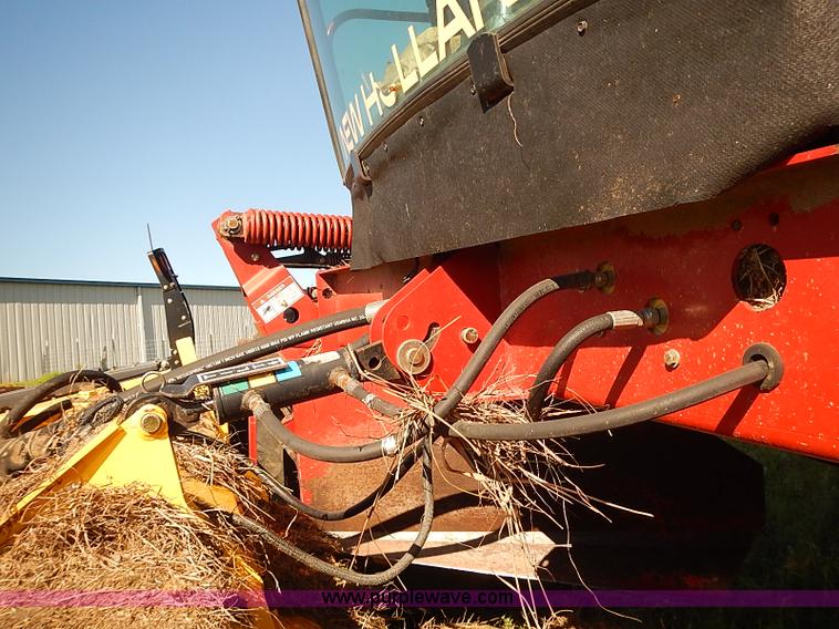 image for item J2239 2003 New Holland HW320 self-propelled swather