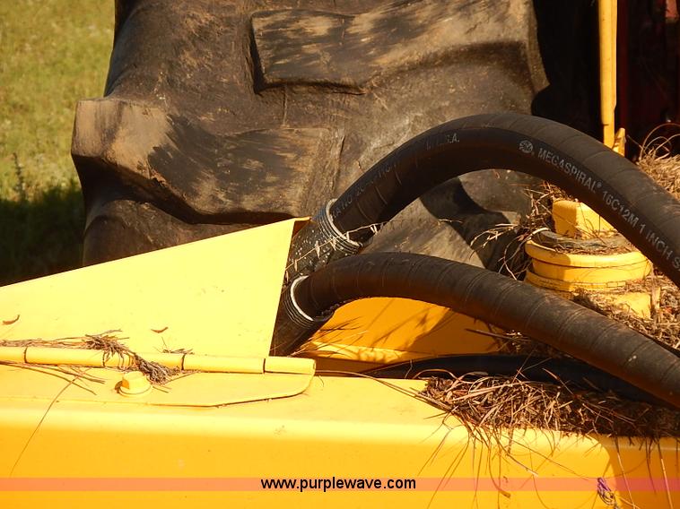 image for item J2239 2003 New Holland HW320 self-propelled swather