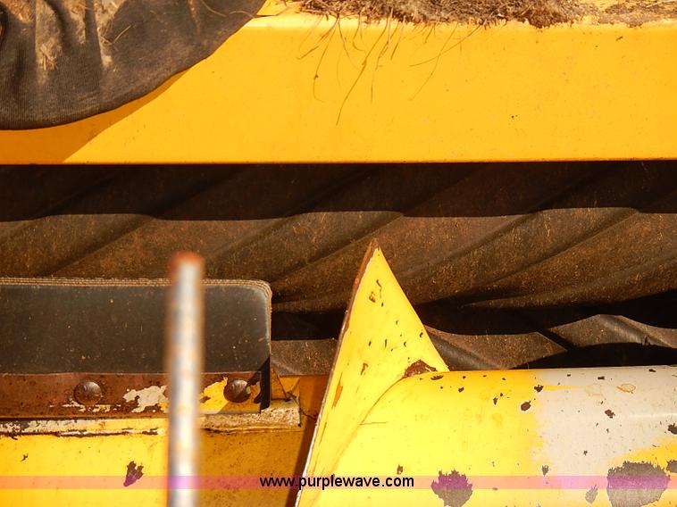 image for item J2239 2003 New Holland HW320 self-propelled swather