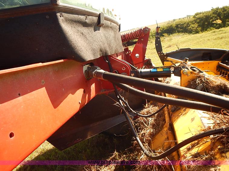 image for item J2239 2003 New Holland HW320 self-propelled swather