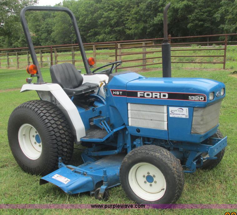 image for item J2414 Ford 1320 MFWD tractor