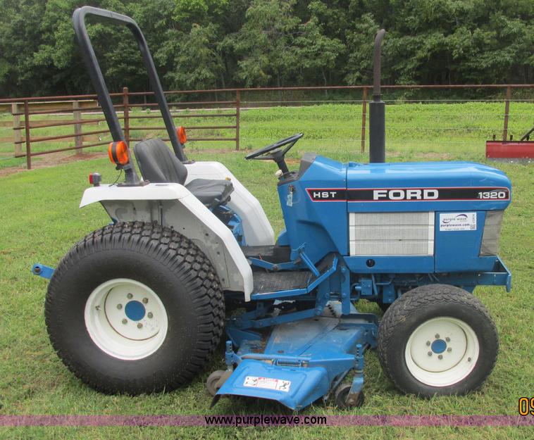 image for item J2414 Ford 1320 MFWD tractor