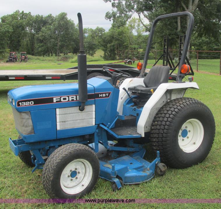 image for item J2414 Ford 1320 MFWD tractor