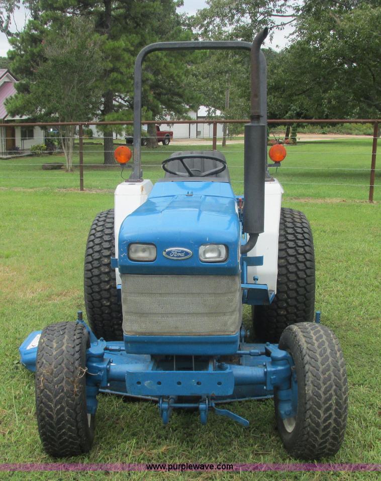 image for item J2414 Ford 1320 MFWD tractor
