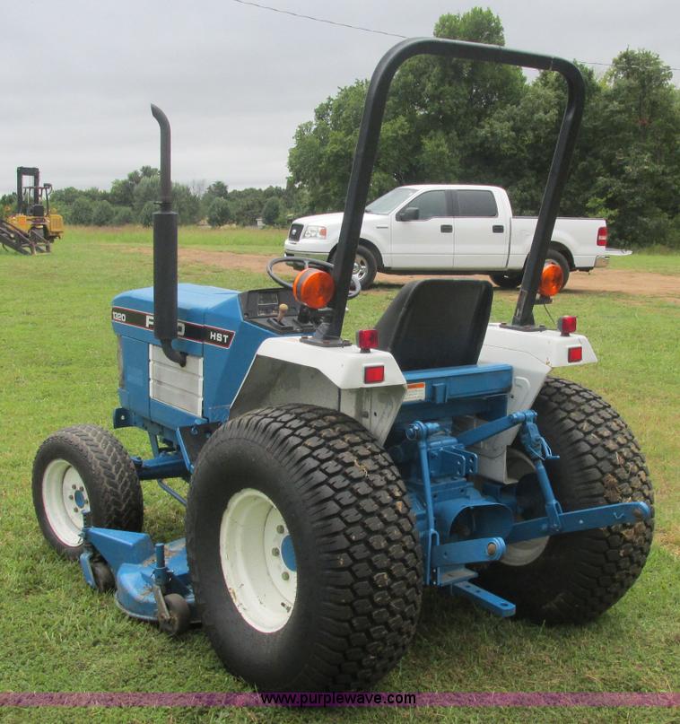 image for item J2414 Ford 1320 MFWD tractor