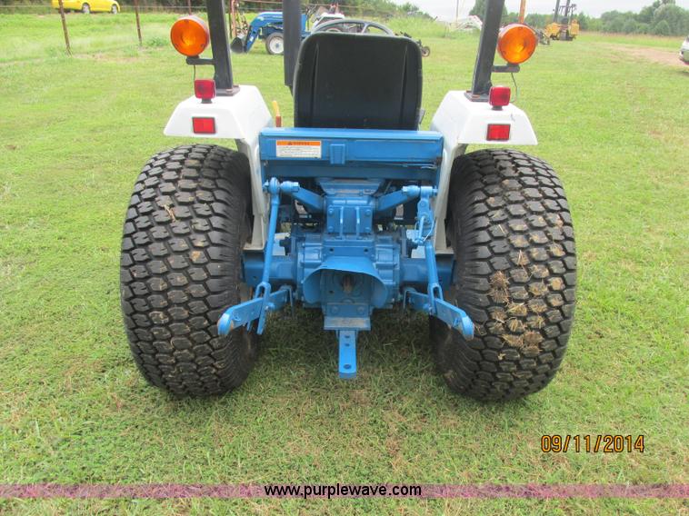 image for item J2414 Ford 1320 MFWD tractor