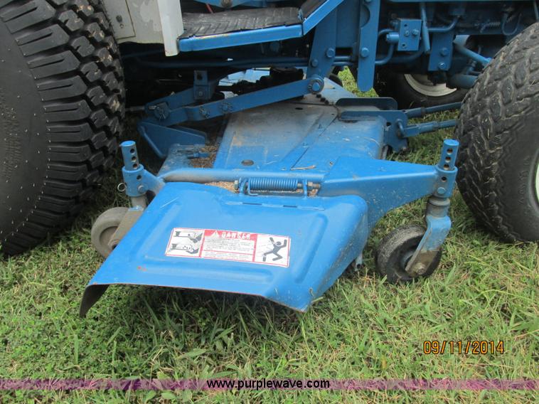 image for item J2414 Ford 1320 MFWD tractor