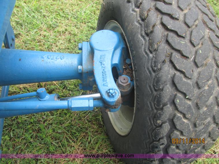 image for item J2414 Ford 1320 MFWD tractor