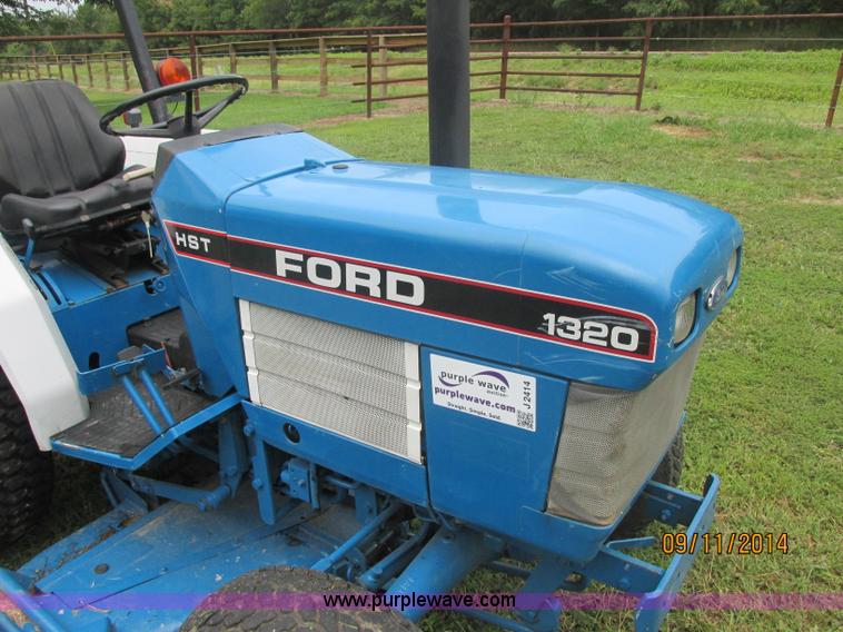 image for item J2414 Ford 1320 MFWD tractor