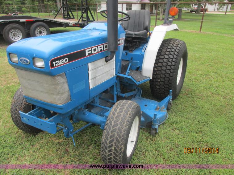 image for item J2414 Ford 1320 MFWD tractor