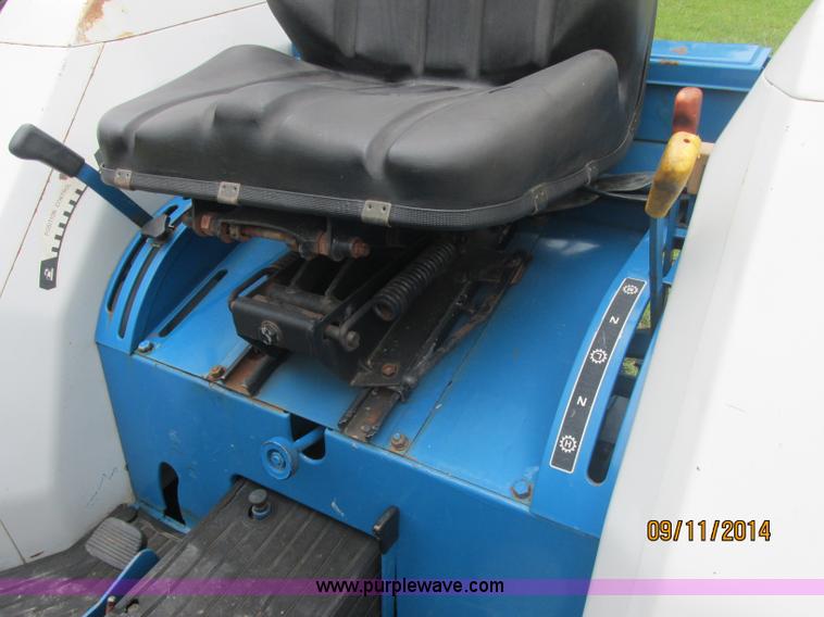 image for item J2414 Ford 1320 MFWD tractor